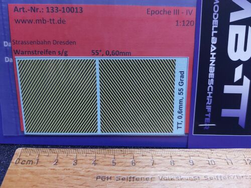 Zubehördecal, Warnstreifen s/g, 55°, 0,60mm, UV-Technik, III-IV, TT