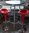 Table de bar avec plateau Impala et 2 tabourets rouges réglables en hauteur - occasion