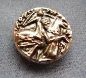 Antique silver metallic button