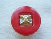 Dyed button, metallic effect centre