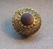 Antique gold metallic button