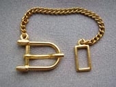 Gilt metal buckle with chain