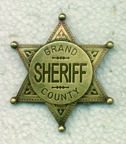 INSIGNIA PLACA GRAND COUNTY SHERIFF LATÓN.